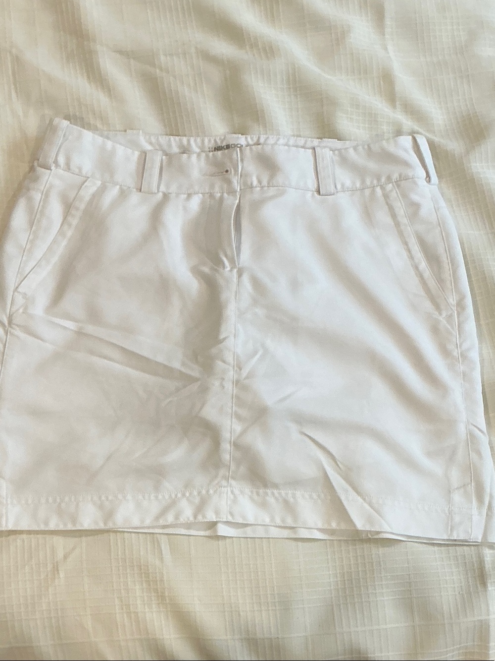 Nike size 8 skort..sm spots.. not very noticeable.. reflected in price